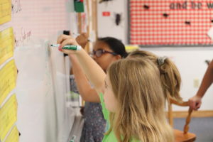 4th Graders Solve Problems on the Board