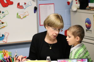 Mrs. Watts with a Kindergarten Student